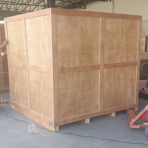 A heavy-duty plywood crate fabricated around equipment in the M&C workshop